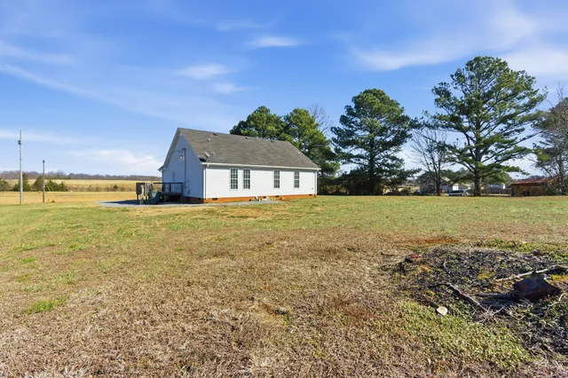 a house view with a garden space