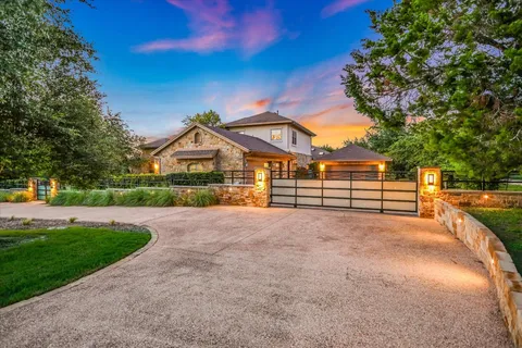 a view of a house with outdoor space and porch