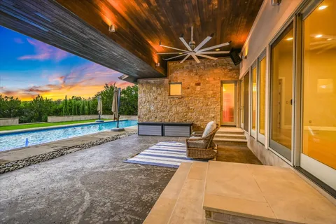 a view of a garden with an outdoor seating