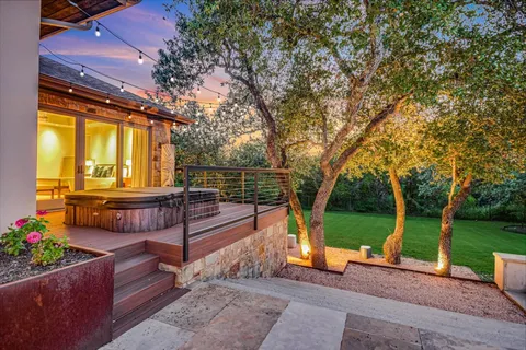 a view of a park with large trees