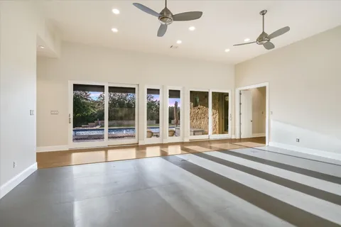 a view of an entryway with wooden floor