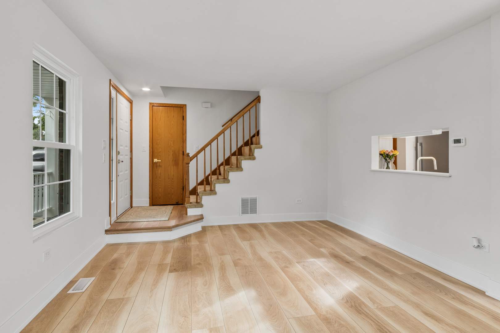14710 Kenton Avenue Midlothian, IL 60445 - Photo 3 of 20 a view of an empty room with stairs