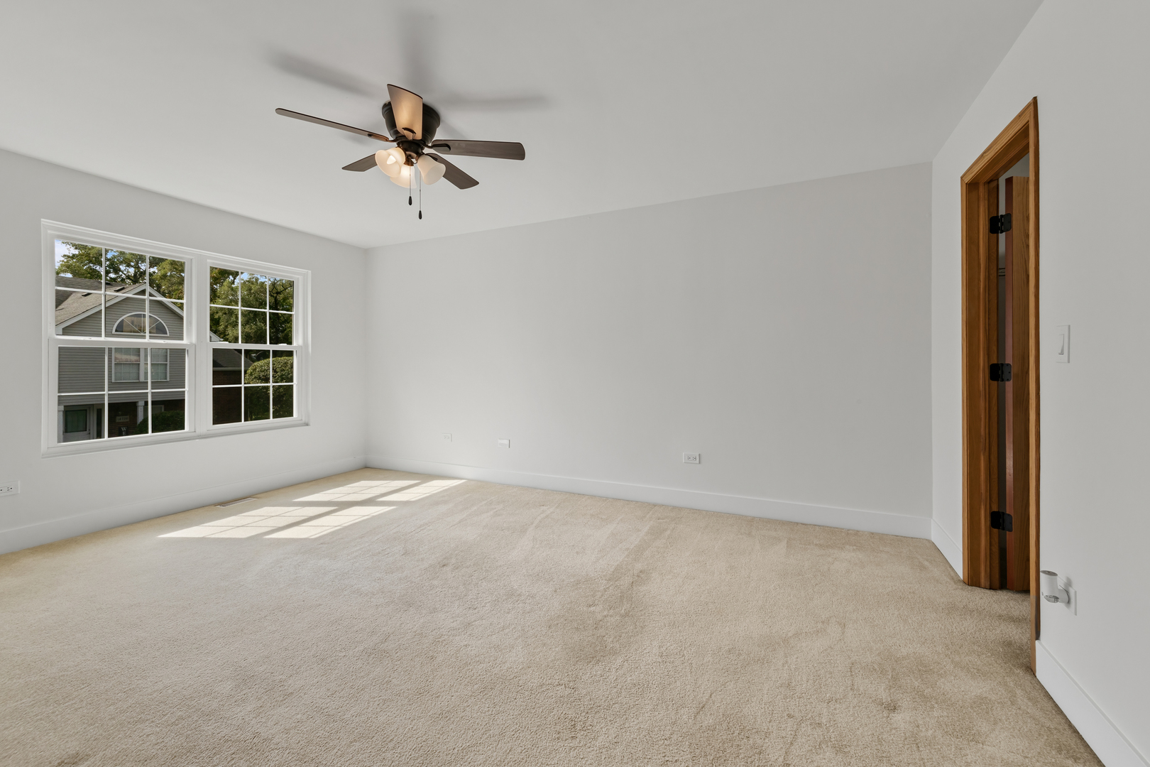 14710 Kenton Avenue Midlothian, IL 60445 - Photo 9 of 20 a view of an empty room with a window