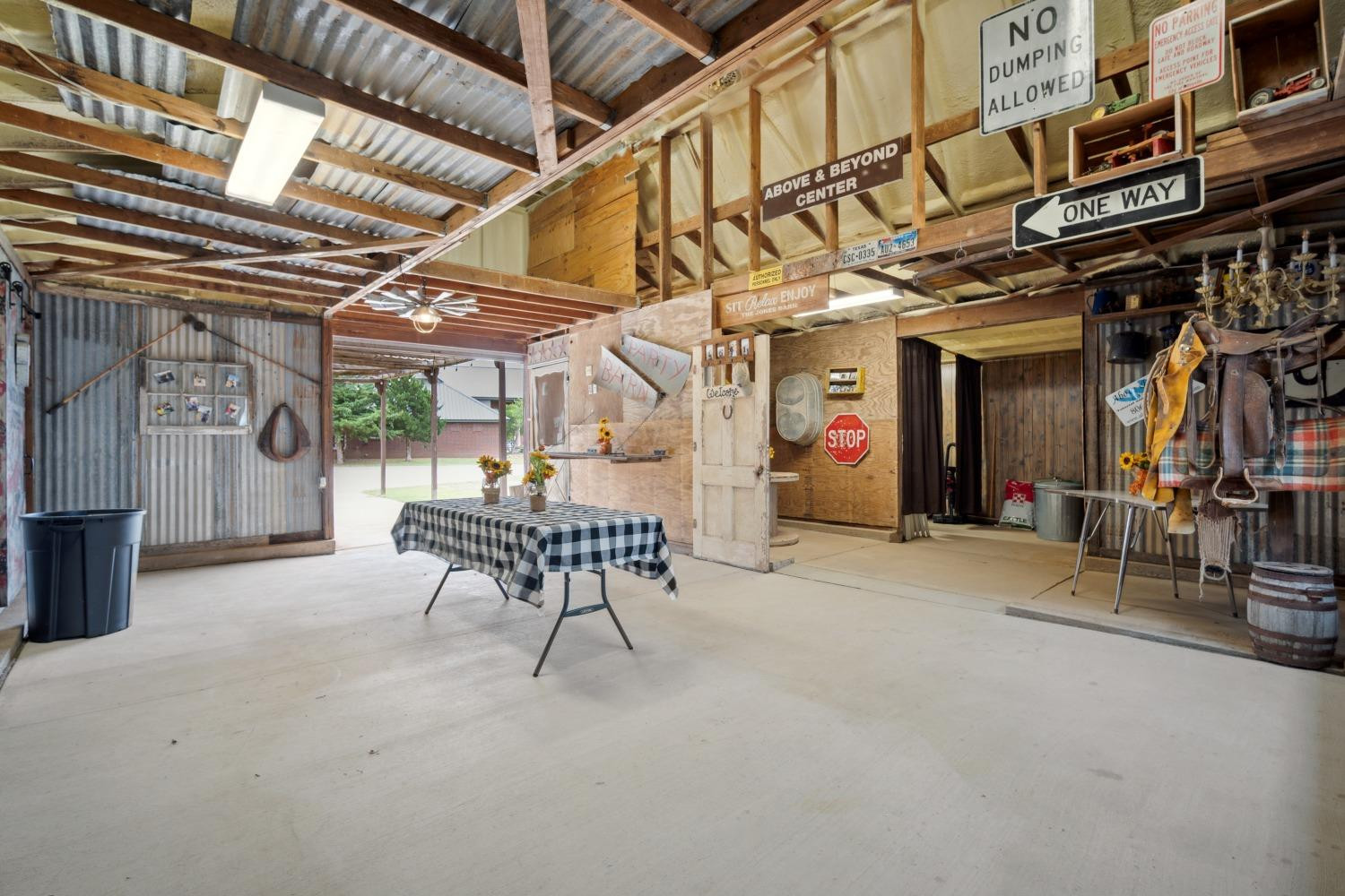 9002 Woodrow Road Wolfforth, TX 79382 - Photo 33 of 48 a view of a room with wooden walls