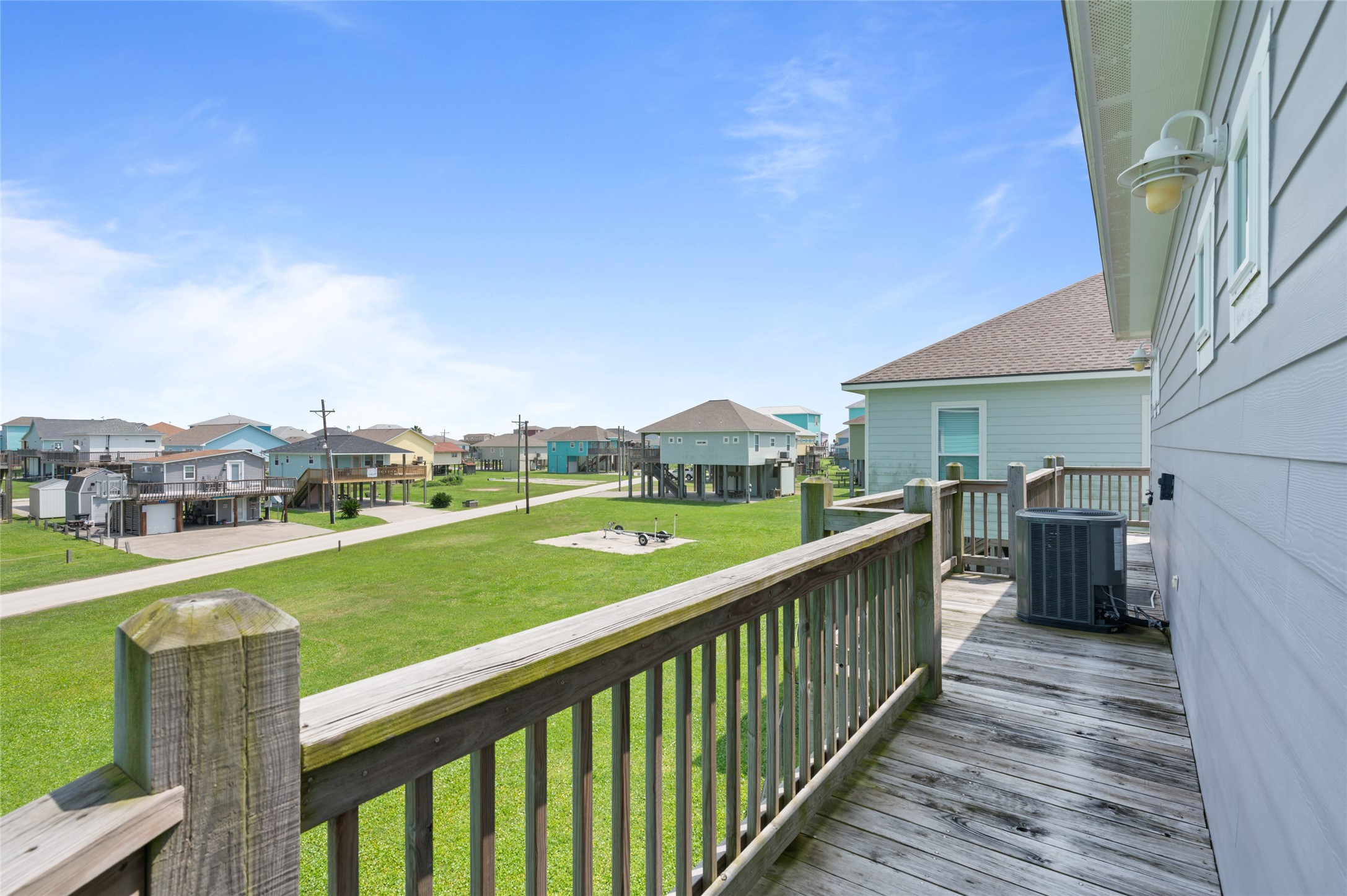 982 South Redfish Crystal Beach, TX 77650 - Photo 14 of 44 a view of a house with a yard