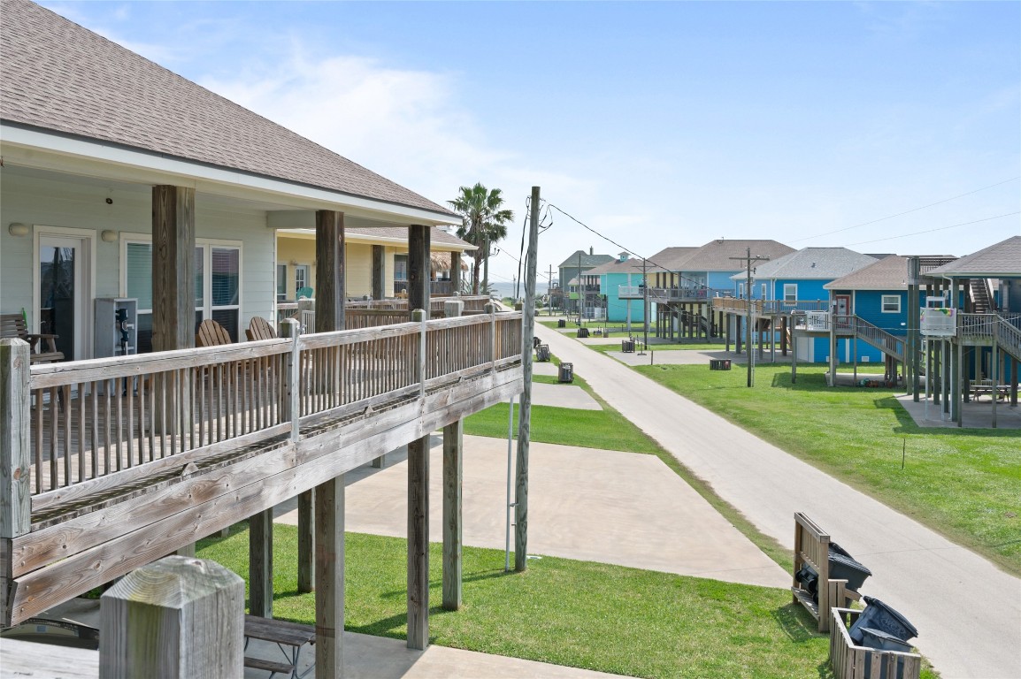 982 South Redfish Crystal Beach, TX 77650 - Photo 15 of 44 a view of a house with a yard and furniture