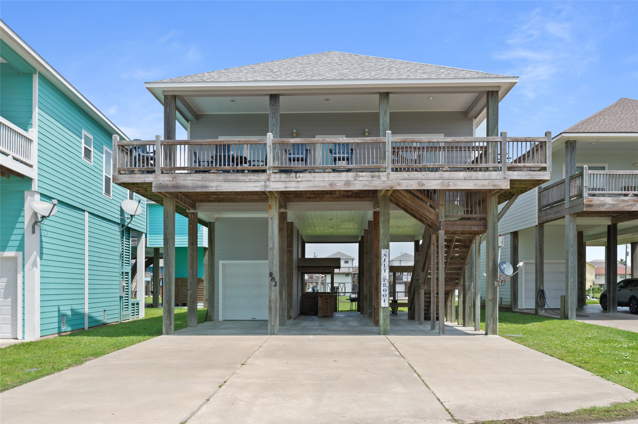 982 South Redfish Crystal Beach, TX 77650 - Photo 2 of 44 a view of a car park of the apartment building