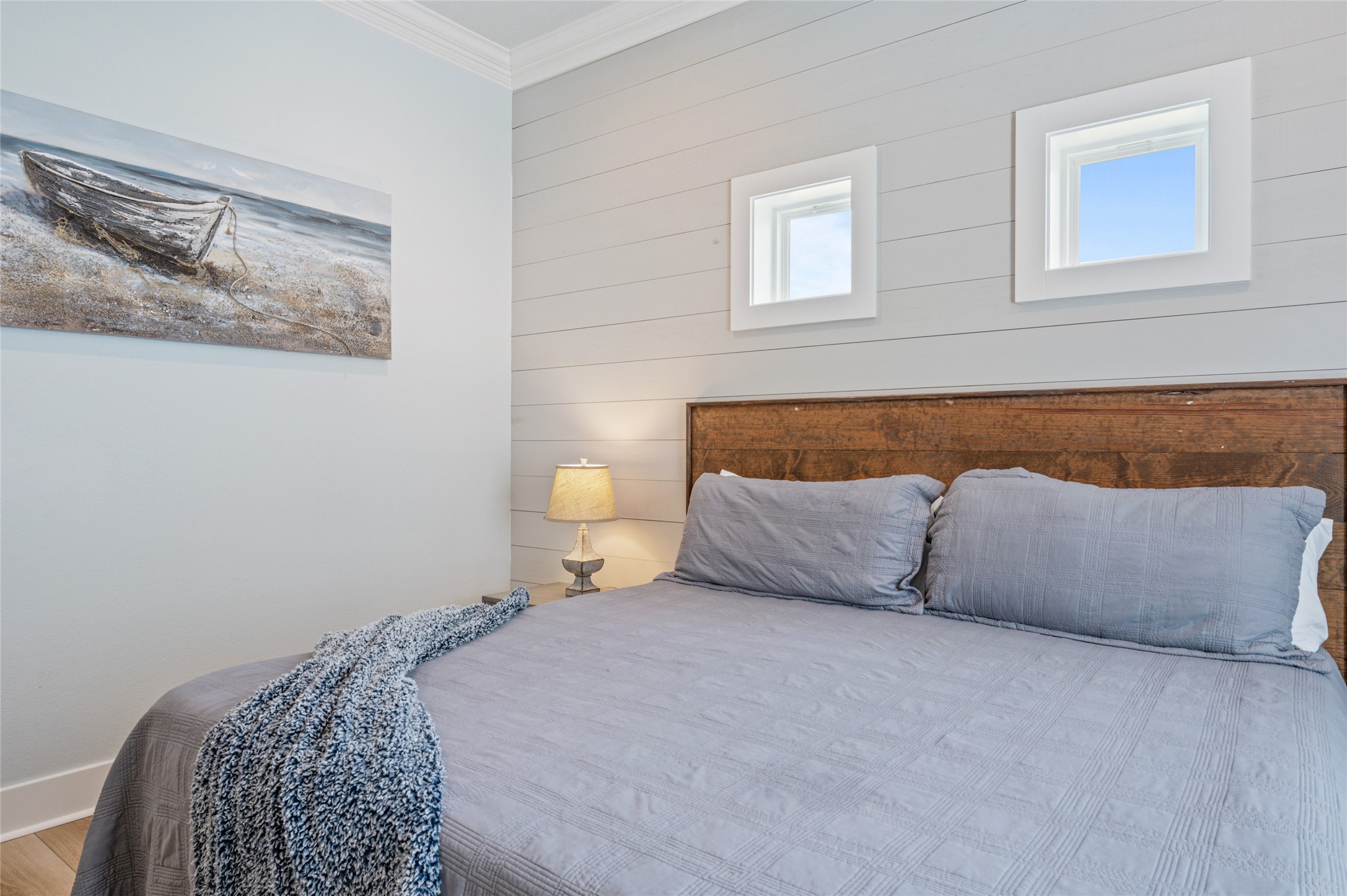 982 South Redfish Crystal Beach, TX 77650 - Photo 31 of 44 a bedroom with a bed and bathroom