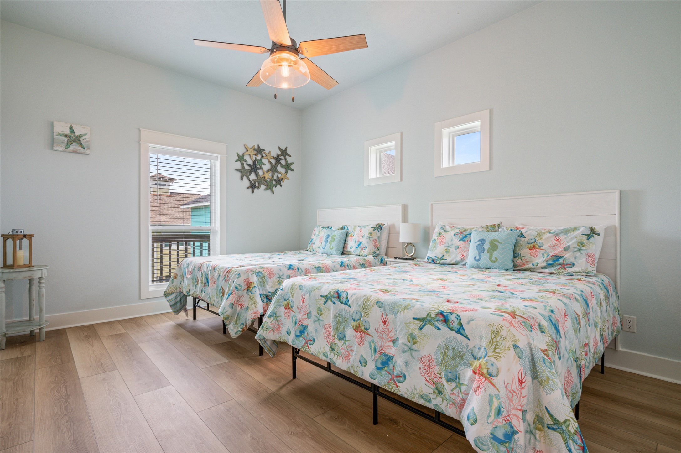 982 South Redfish Crystal Beach, TX 77650 - Photo 37 of 44 a bedroom with a large bed and a window