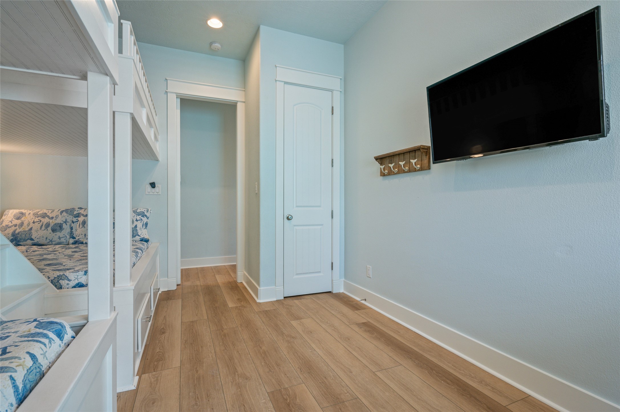 982 South Redfish Crystal Beach, TX 77650 - Photo 44 of 44 a view of a livingroom with wooden floor and closet