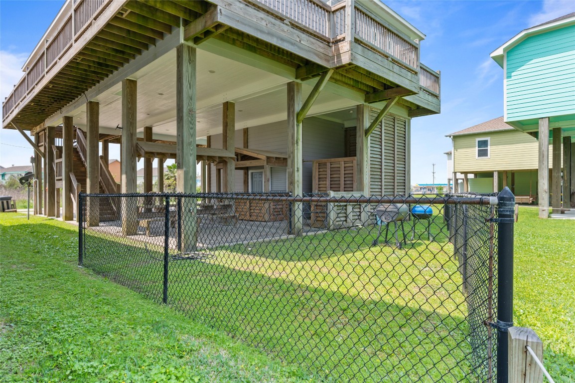 982 South Redfish Crystal Beach, TX 77650 - Photo 8 of 44 a view of a house with a backyard