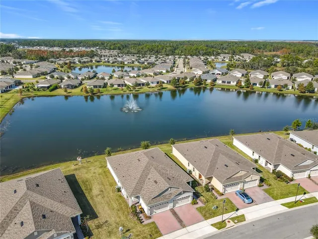 an aerial view of a house with a garden