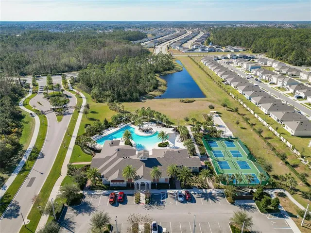 a living room with lots of furniture and a flat screen tv