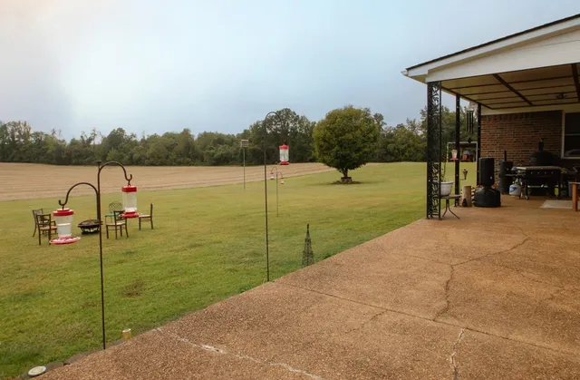 a view of a lake with a yard