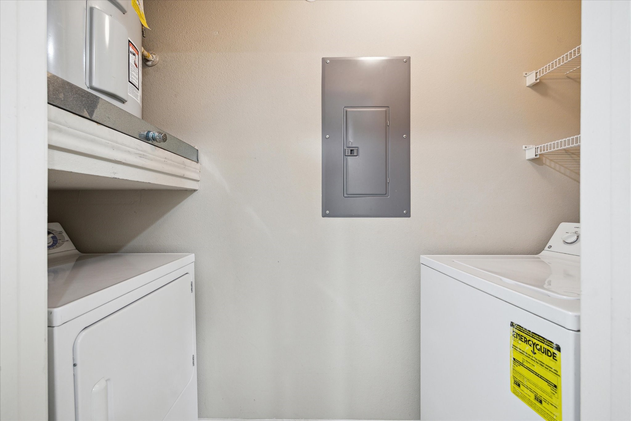 2400 McCue Road, Unit 460 Houston, TX 77056 - Photo 13 of 21 a utility room with dryer and washer