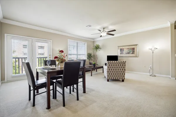 a view of a livingroom with furniture and window
