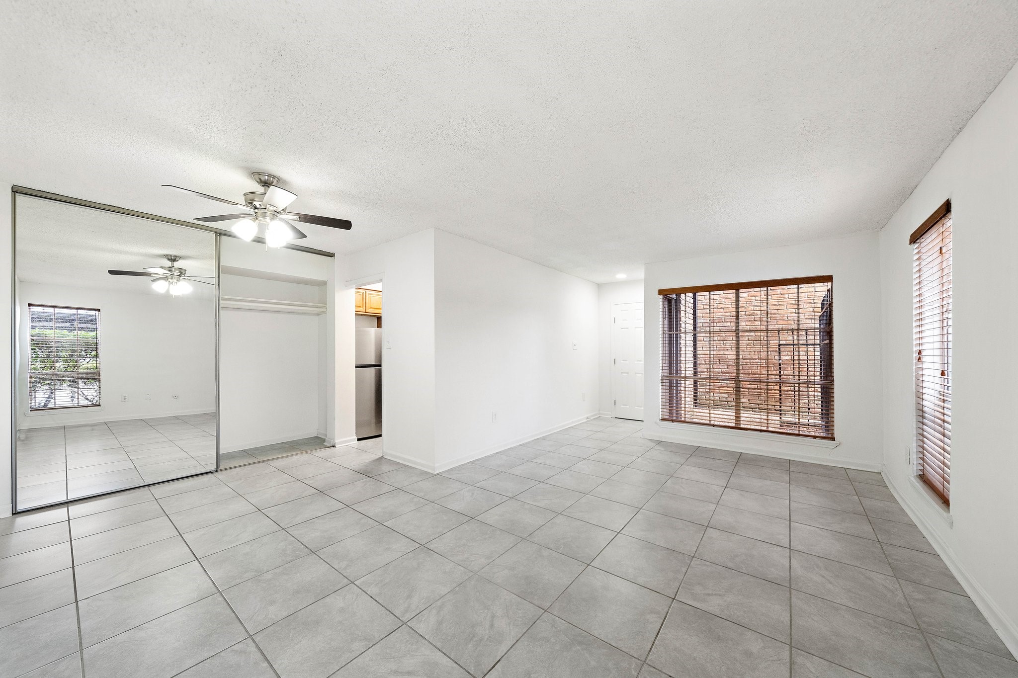 711 Holiday Drive, Unit 63 Galveston, TX 77550 - Photo 2 of 10 a view of an empty room with a window