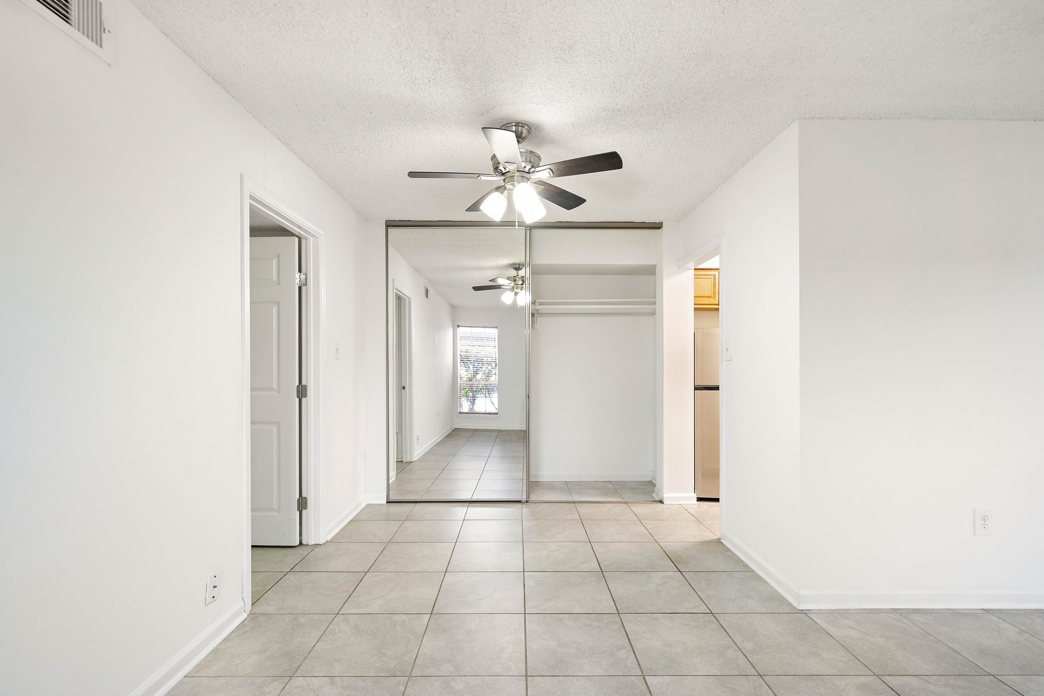 711 Holiday Drive, Unit 63 Galveston, TX 77550 - Photo 3 of 10 a view of an empty room and kitchen view