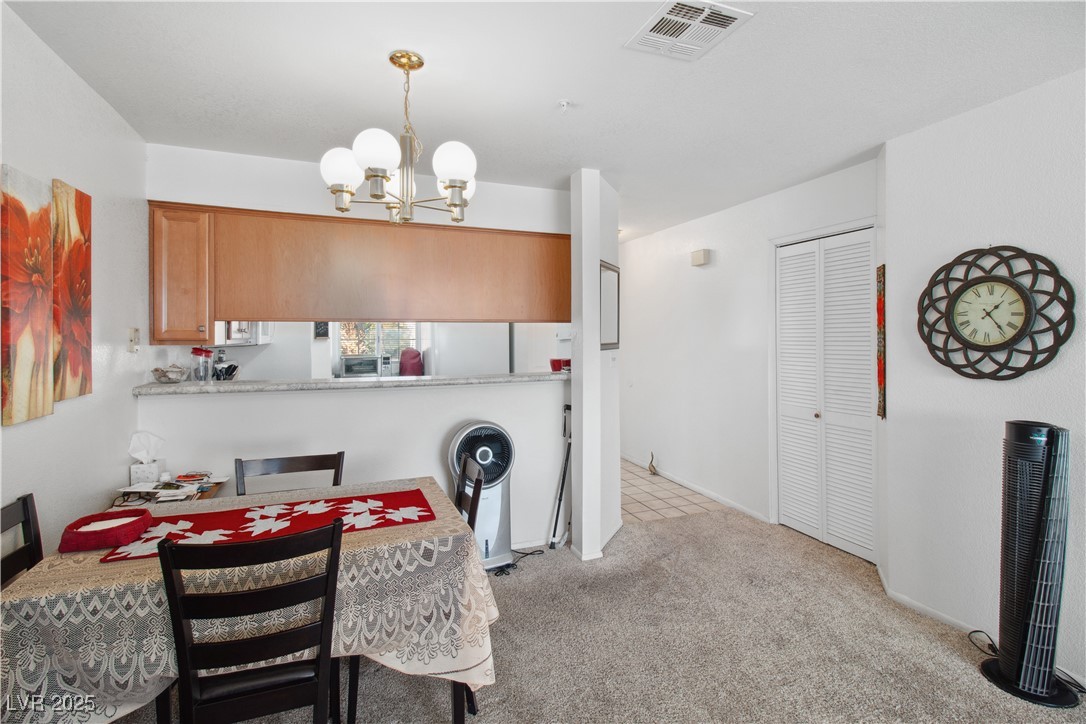 2044 Mesquite Lane, Unit 302 Laughlin, NV 89029 - Photo 14 of 45 Alternate angle of the Dining area with closet for