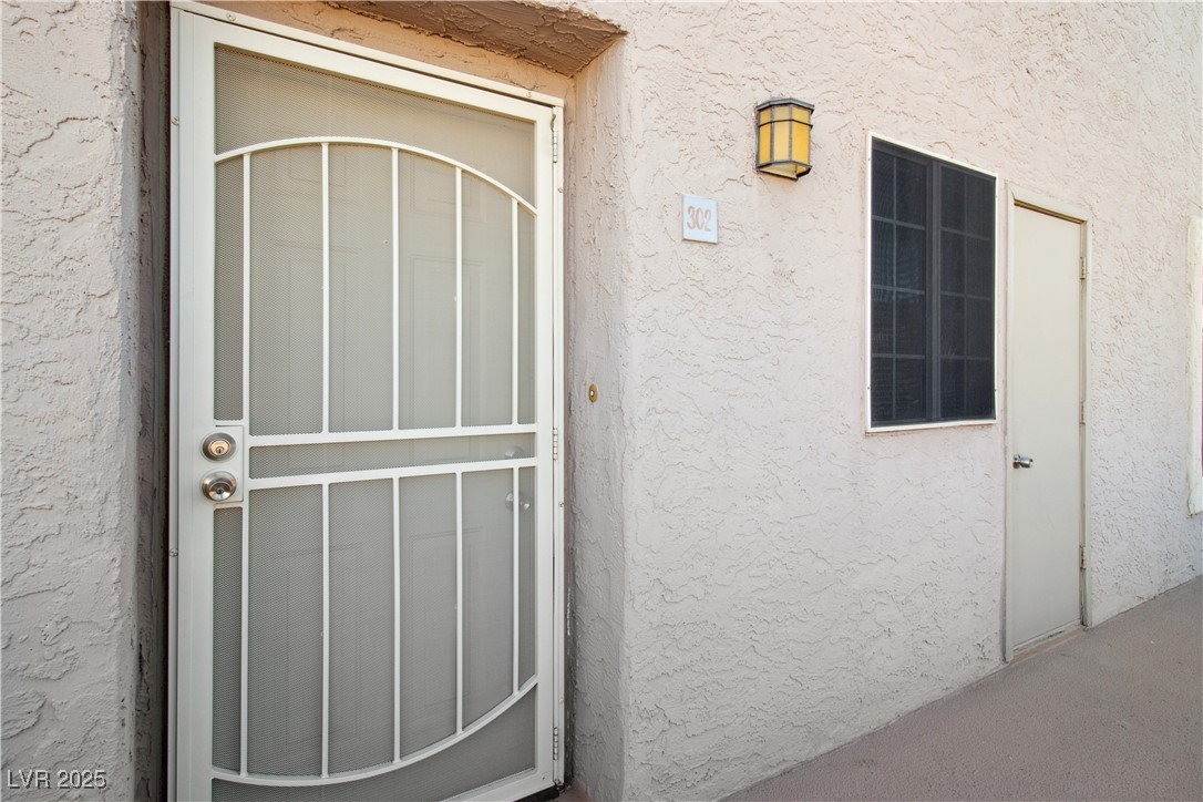 2044 Mesquite Lane, Unit 302 Laughlin, NV 89029 - Photo 3 of 45 Front door entry.