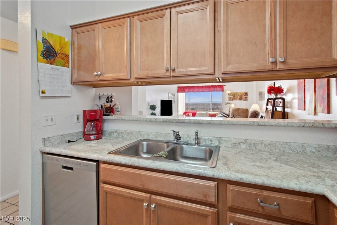 2044 Mesquite Lane, Unit 302 Laughlin, NV 89029 - Photo 10 of 45 The Kitchen with breakfast bar, perfect for stool