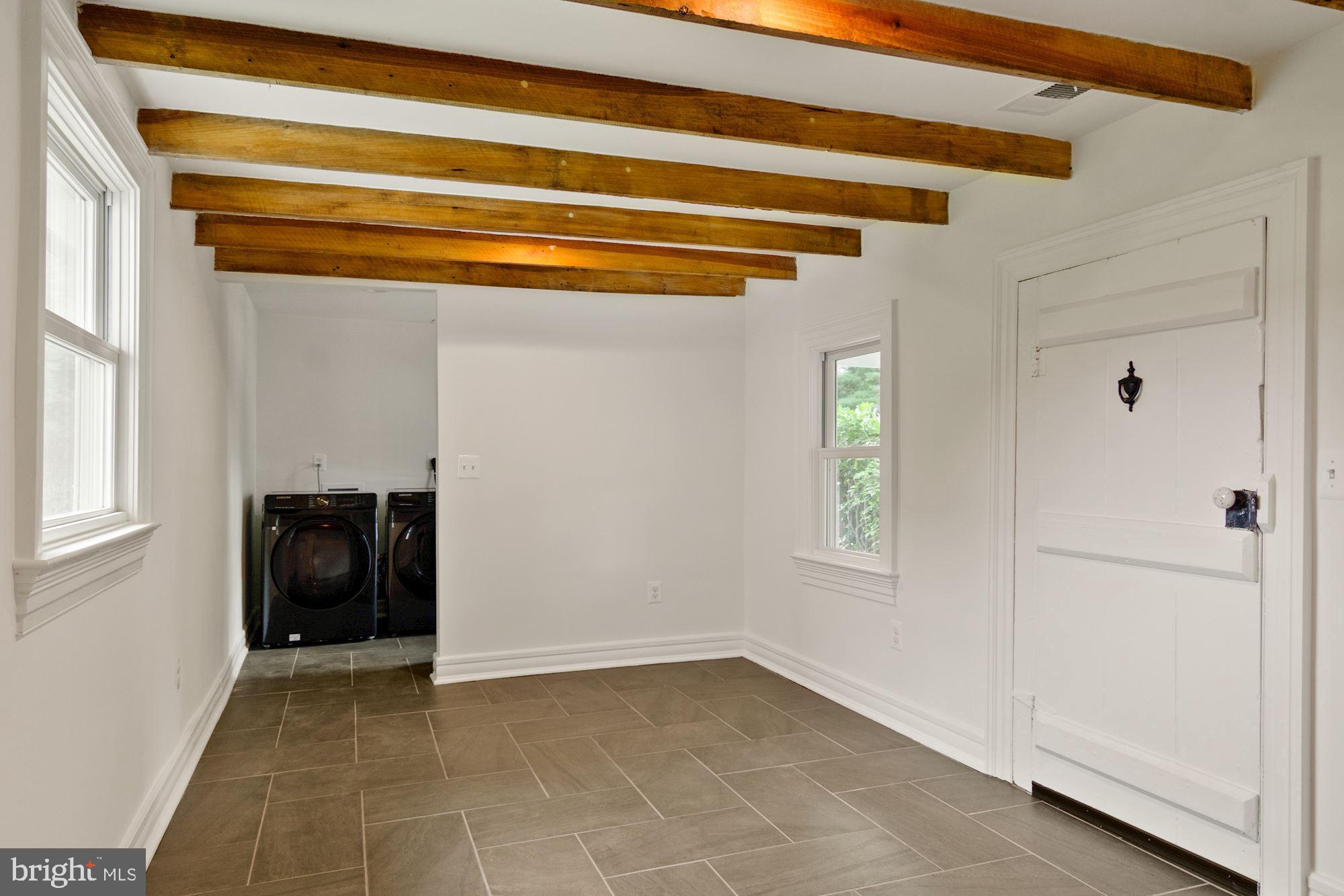 7021 Leeds Manor Road Marshall, VA 20115 - Photo 12 of 31 Mud room and laundry, original beam ceiling