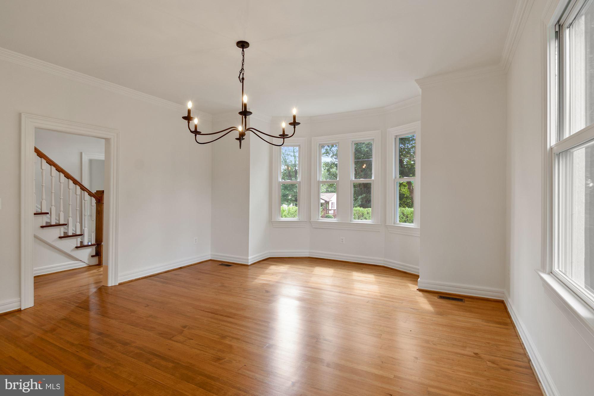 7021 Leeds Manor Road Marshall, VA 20115 - Photo 3 of 31 Lovely chandelier graces dining room