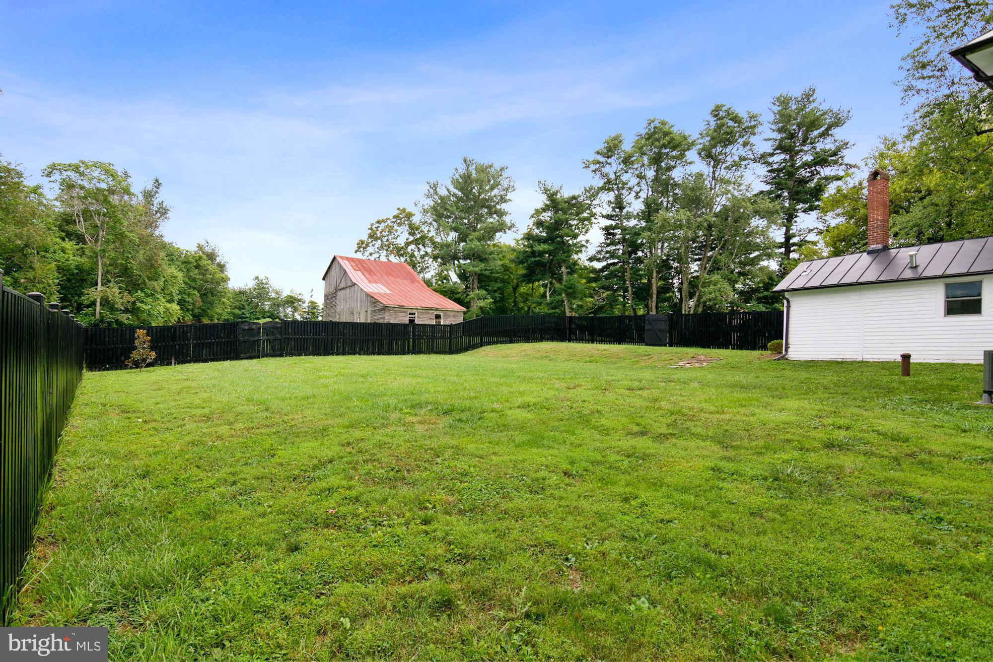 7021 Leeds Manor Road Marshall, VA 20115 - Photo 29 of 31 Side yard fully fenced ready for your ideas