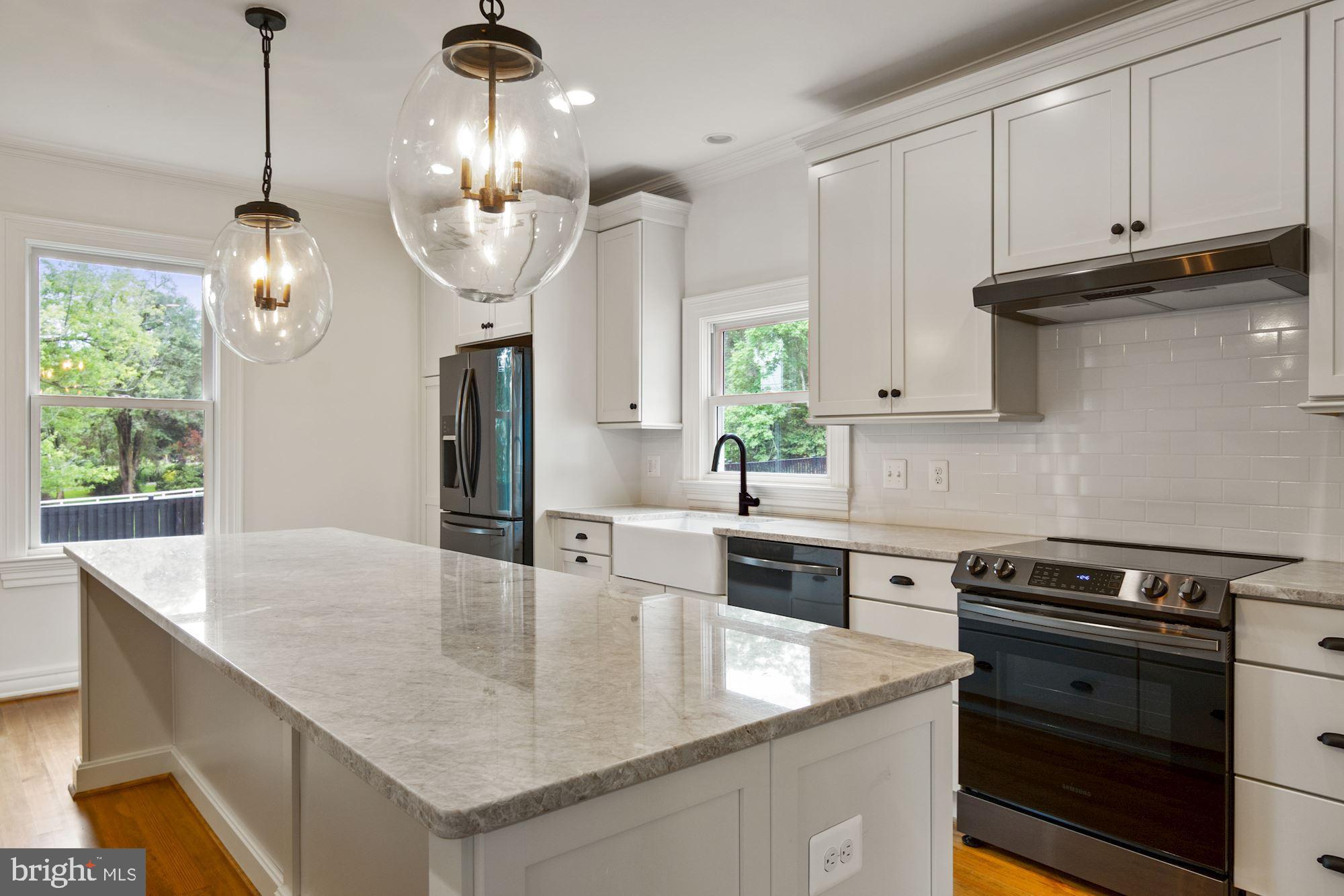 7021 Leeds Manor Road Marshall, VA 20115 - Photo 7 of 31 The kitchen features Taj Mahal Quartz