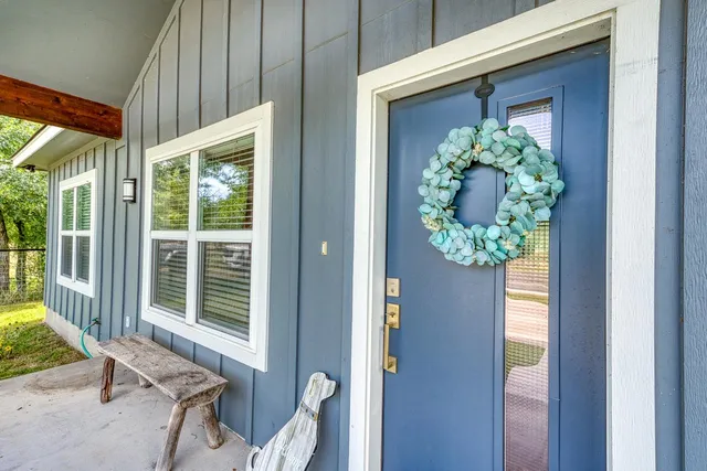 a view of a porch with a bench