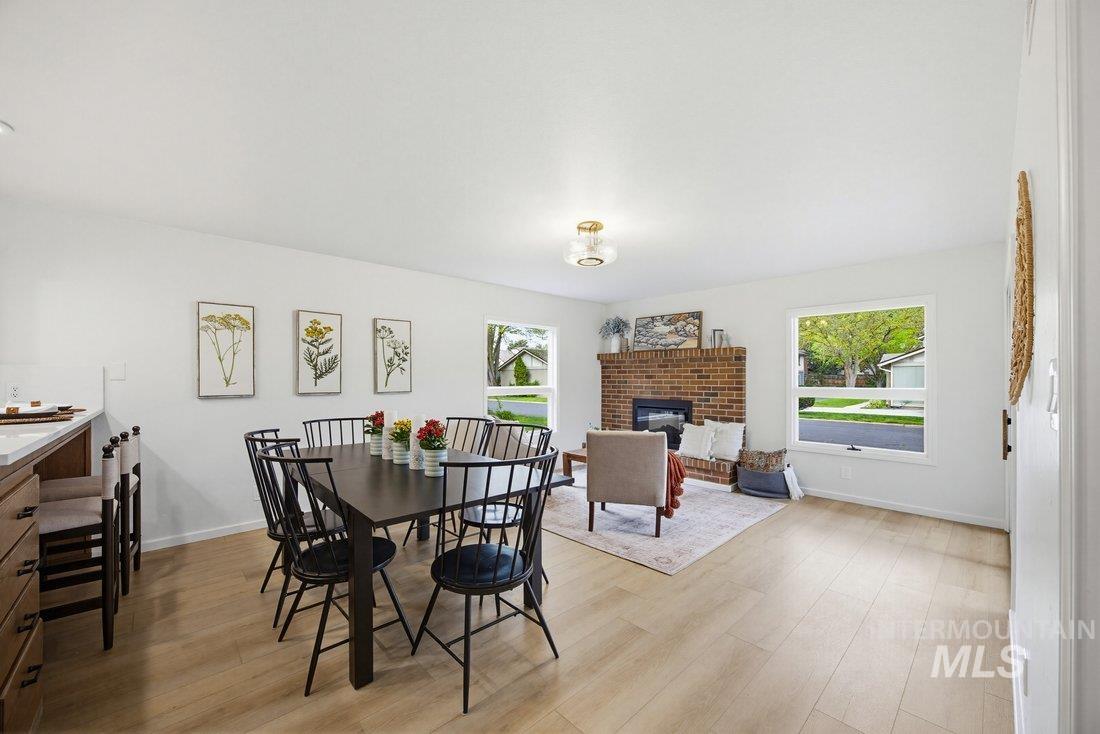 1549 Lenz Lane Boise, ID 83712 - Photo 4 of 42 Great Room staged with Dining/Hearth Option