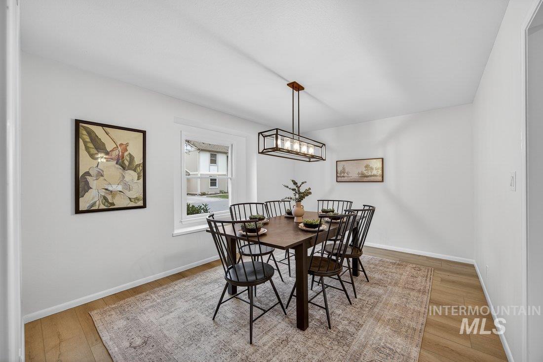 1549 Lenz Lane Boise, ID 83712 - Photo 9 of 42 Flex room staged as dining room