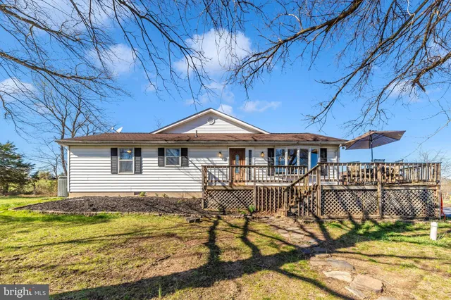 a front view of a house with swimming pool