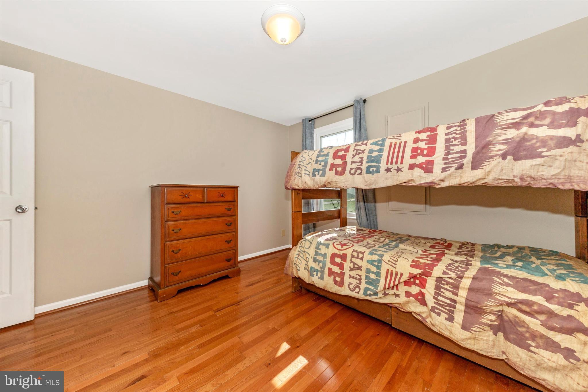 17449 Irishtown Road Emmitsburg, MD 21727 - Photo 22 of 77 a bedroom with a bed and a dresser