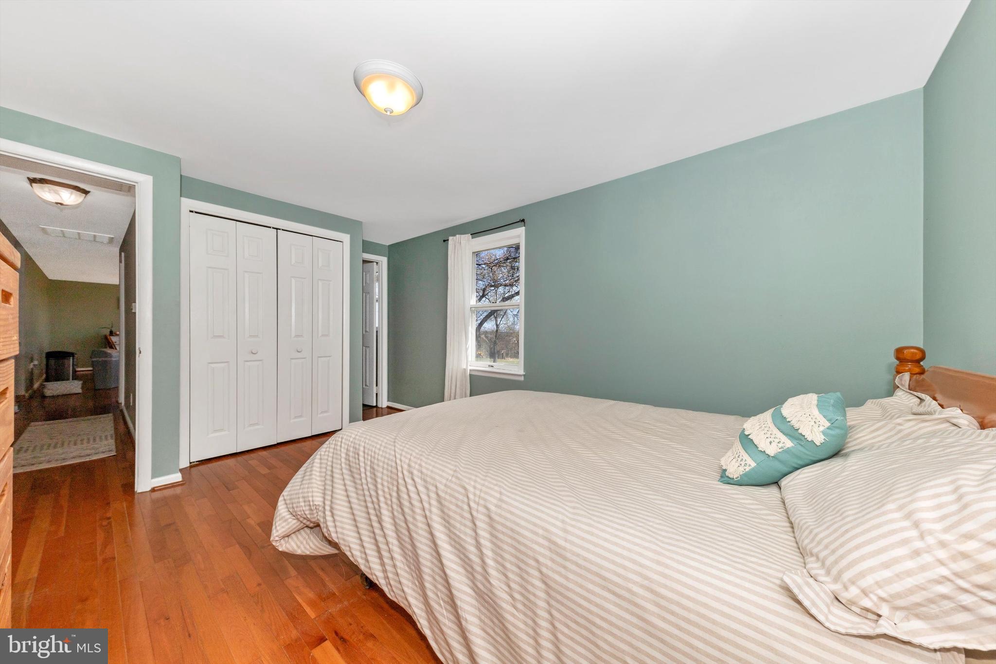 17449 Irishtown Road Emmitsburg, MD 21727 - Photo 25 of 77 a bedroom with a bed and a table