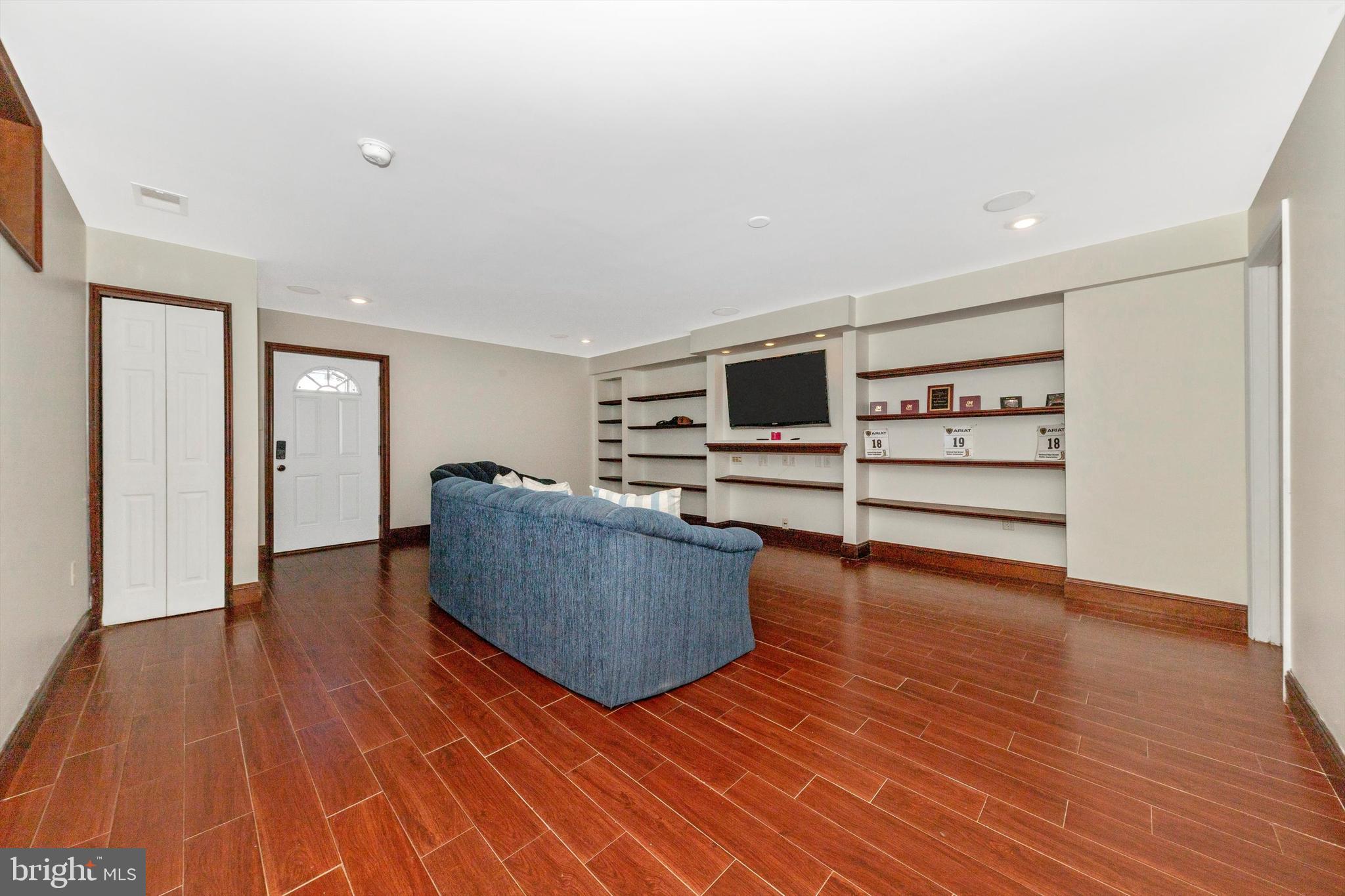 17449 Irishtown Road Emmitsburg, MD 21727 - Photo 31 of 77 a living room with furniture and a wooden floor