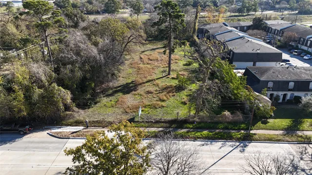 an aerial view of residential house with outdoor space