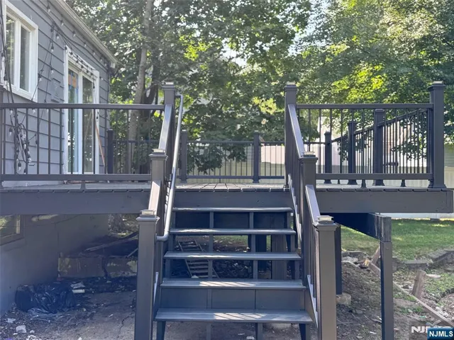 a view of a bench in the backyard