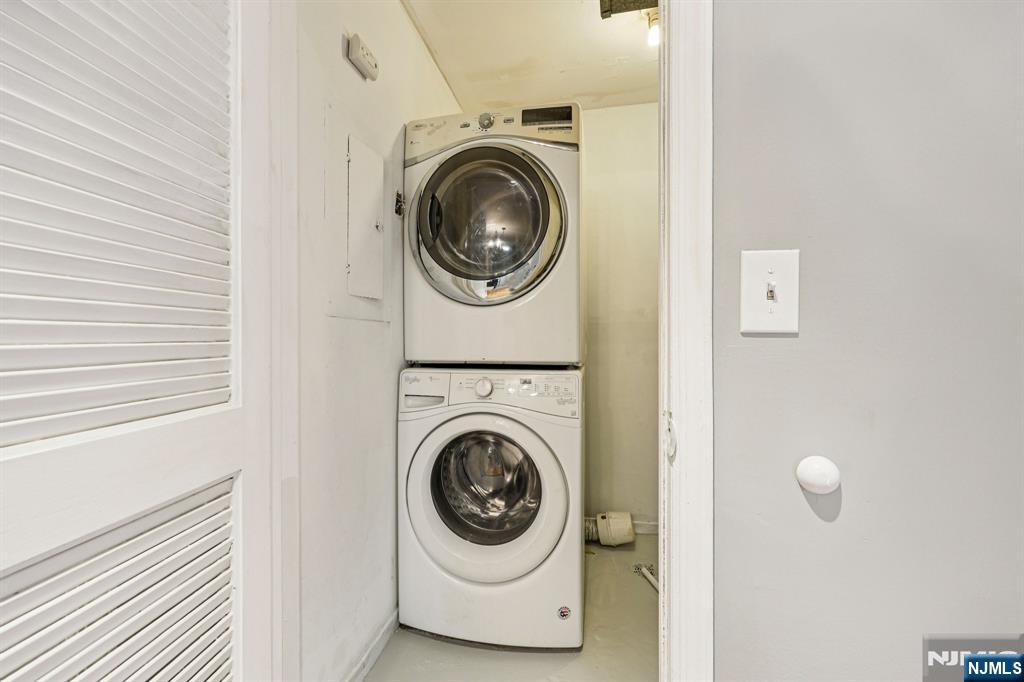 105 State Street, Unit 1H Hackensack, NJ 07601 - Photo 16 of 23 a utility room with dryer and washer