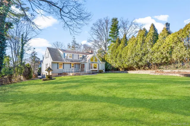a view of a house with a big yard