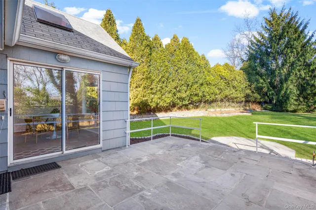 a view of backyard with green space