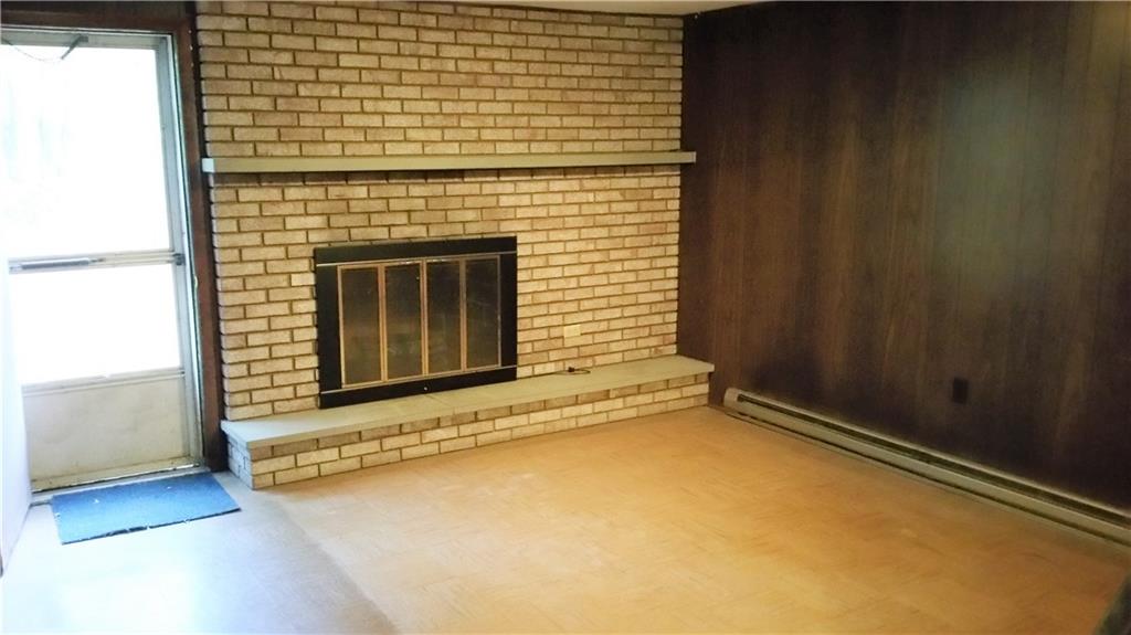 3900 Shepard Road Gibsonia, PA 15044 - Photo 22 of 24 fireplace and door to back yard