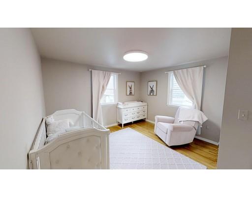 115 Fulton Spring Road Medford, MA 02155 - Photo 21 of 39 a living room with furniture and a window