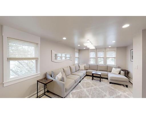 115 Fulton Spring Road Medford, MA 02155 - Photo 3 of 39 a living room with furniture and a large window