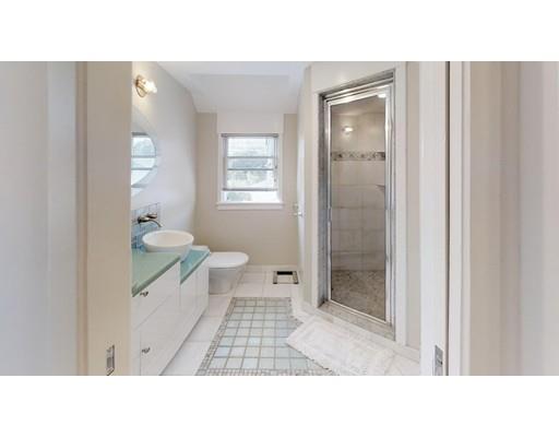 115 Fulton Spring Road Medford, MA 02155 - Photo 31 of 39 a bathroom with a toilet a sink and shower