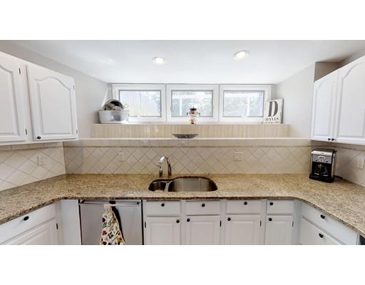 115 Fulton Spring Road Medford, MA 02155 - Photo 8 of 39 a kitchen with sink and cabinets