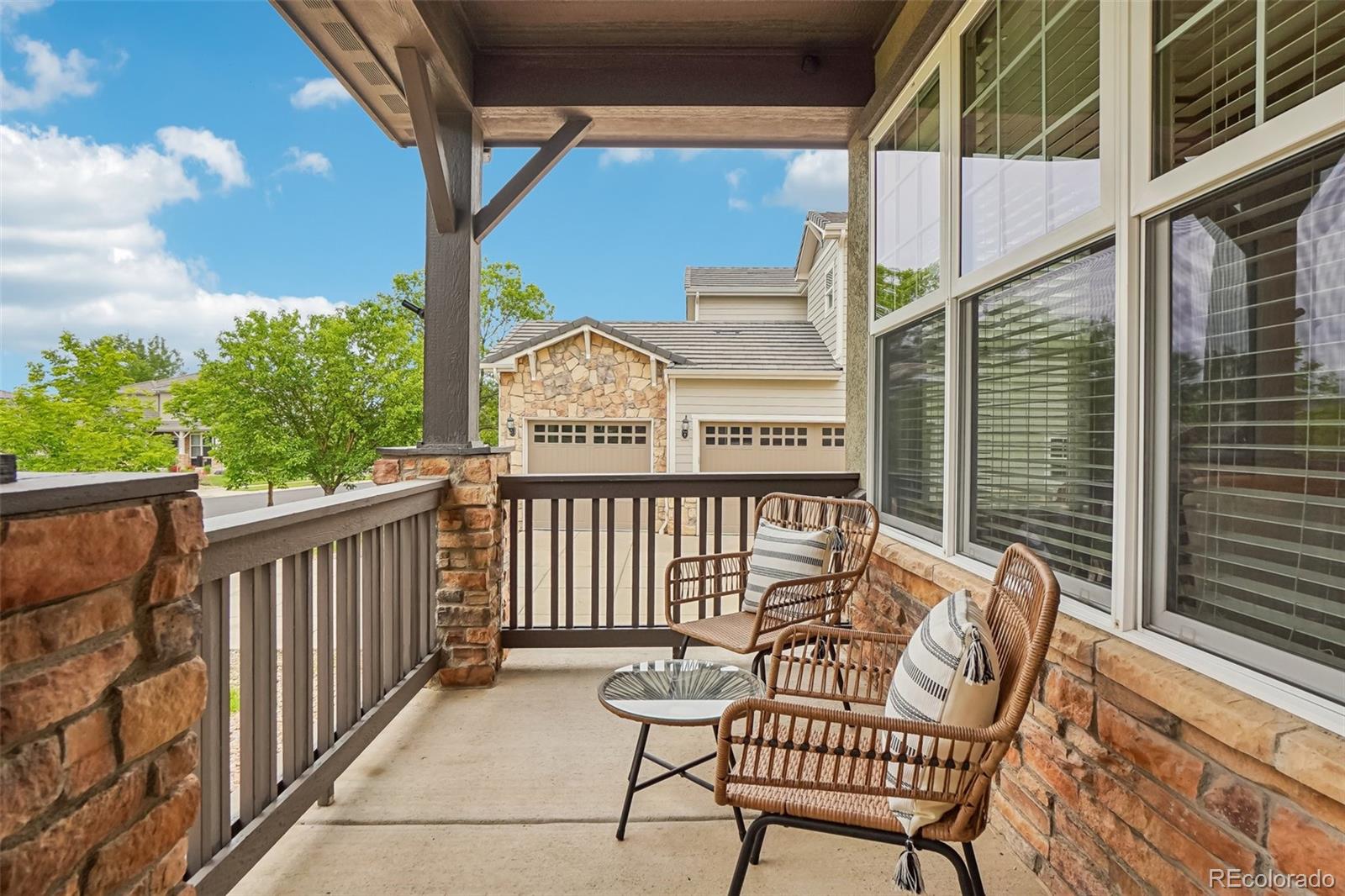 2605 Gray Wolf Loop Broomfield, CO 80023 - Photo 4 of 49 a view of a chair in the balcony