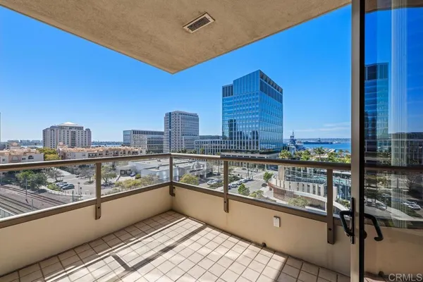 a view of a balcony with city view