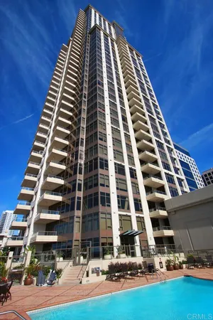 a view of a building with a yard