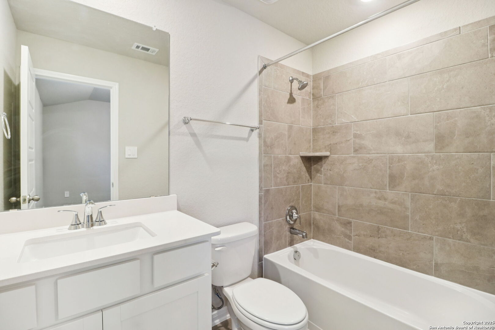 114 Dakota Ridge Cibolo, TX 78108 - Photo 23 of 39 a bathroom with a sink toilet vanity and shower